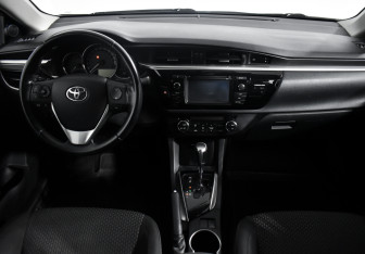 Подержанный автомобиль Toyota Corolla Sedan 2014 года (14 фото)