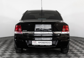 Подержанный автомобиль Opel Astra Sedan 2011 года (7 фото)