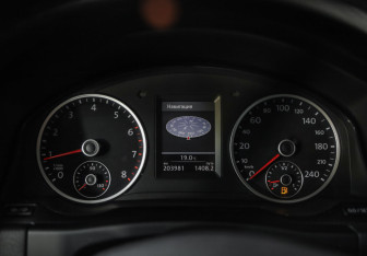 Подержанный автомобиль Volkswagen Tiguan 2013 года (12 фото)