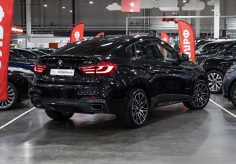Подержанный автомобиль BMW X6 2018 года (7 фото)