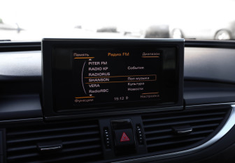 Подержанный автомобиль Audi A7 2012 года (21 фото)