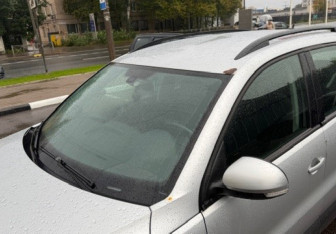 Подержанный автомобиль Volkswagen Tiguan 2013 года (9 фото)