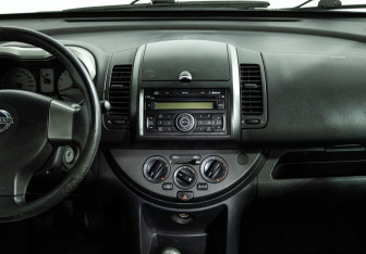 Подержанный автомобиль Nissan Note 2008 года (14 фото)