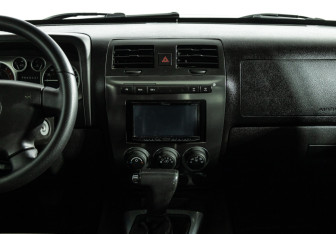 Подержанный автомобиль Hummer H3 Suv 2009 года (14 фото)