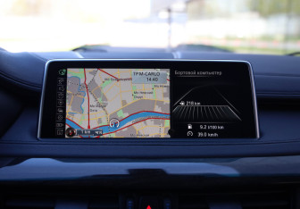 Подержанный автомобиль BMW X6 2015 года (18 фото)