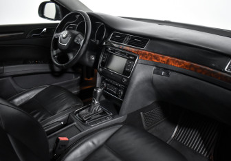 Подержанный автомобиль Skoda Superb Liftback 2013 года (14 фото)