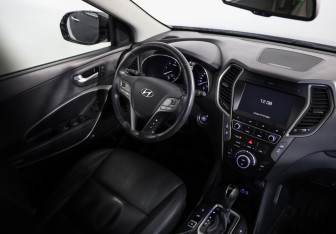 Подержанный автомобиль Hyundai Santa Fe 2015 года (9 фото)