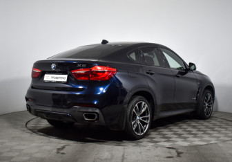 Подержанный автомобиль BMW X6 2016 года (5 фото)