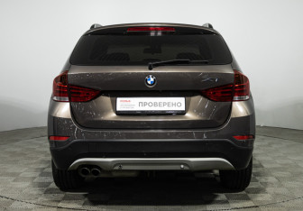 Подержанный автомобиль BMW X1 2013 года (6 фото)