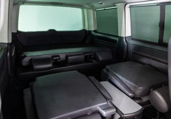 Подержанный автомобиль Volkswagen Multivan 2010 года (22 фото)