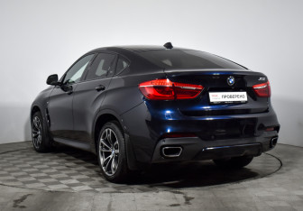 Подержанный автомобиль BMW X6 2016 года (7 фото)