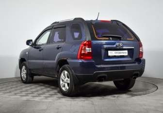 Подержанный автомобиль Kia Sportage 2009 года (7 фото)