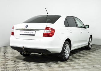 Подержанный автомобиль Skoda Rapid Liftback 2014 года (5 фото)
