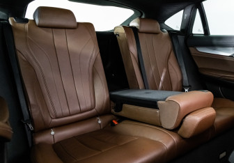 Подержанный автомобиль BMW X6 2015 года (25 фото)