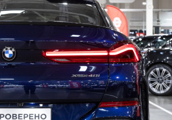 Подержанный автомобиль BMW X6 2021 года (11 фото)