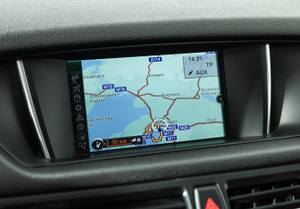 Подержанный автомобиль BMW X1 2014 года (15 фото)