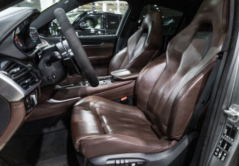 Подержанный автомобиль BMW X6 M 2015 года (17 фото)