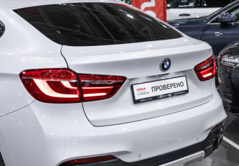 Подержанный автомобиль BMW X6 2016 года (15 фото)