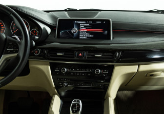Подержанный автомобиль BMW X6 2015 года (14 фото)