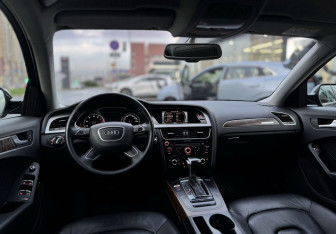Подержанный автомобиль Audi A4 Sedan 2015 года (14 фото)