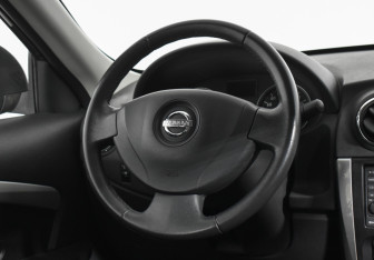 Подержанный автомобиль Nissan Almera Sedan 2014 года (14 фото)