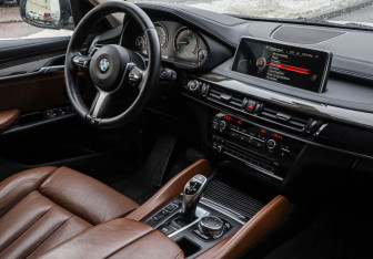 Подержанный автомобиль BMW X6 2016 года (9 фото)