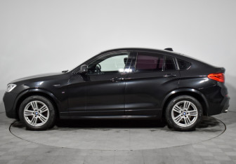 Подержанный автомобиль BMW X4 2015 года (8 фото)