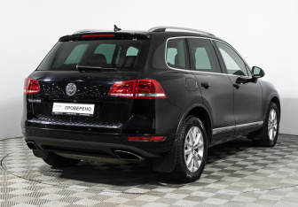 Подержанный автомобиль Volkswagen Touareg 2014 года (5 фото)