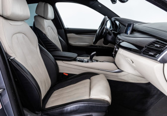 Подержанный автомобиль BMW X6 2018 года (23 фото)