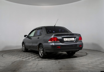Подержанный автомобиль Mitsubishi Lancer Sedan 2006 года (7 фото)