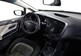 Подержанный автомобиль Kia Ceed Hatchback 2013 года (9 фото)