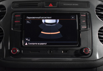 Подержанный автомобиль Volkswagen Tiguan 2015 года (16 фото)