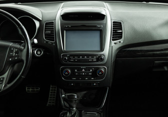 Подержанный автомобиль Kia Sorento 2014 года (14 фото)