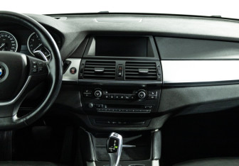 Подержанный автомобиль BMW X6 2013 года (14 фото)