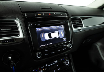 Подержанный автомобиль Volkswagen Touareg 2015 года (15 фото)