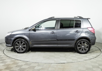 Подержанный автомобиль Geely MK Cross 2013 года (8 фото)