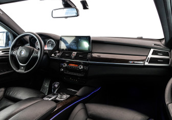 Подержанный автомобиль BMW X6 2013 года (11 фото)