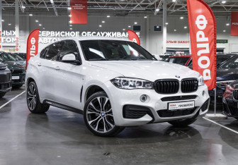 Подержанный автомобиль BMW X6 2016 года (6 фото)