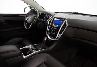 Подержанный автомобиль Cadillac SRX 2013 года (11 фото)