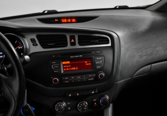 Подержанный автомобиль Kia Ceed Wagon 2015 года (15 фото)