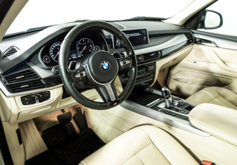Подержанный автомобиль BMW X5 2015 года (11 фото)