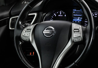 Подержанный автомобиль Nissan Qashqai 2014 года (13 фото)