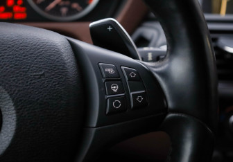 Подержанный автомобиль BMW X6 2013 года (14 фото)