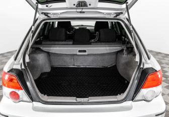 Подержанный автомобиль Subaru Impreza Wagon 2004 года (21 фото)