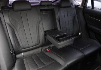 Подержанный автомобиль BMW X6 2016 года (26 фото)