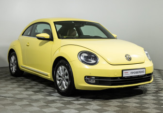 Подержанный автомобиль Volkswagen Beetle Hatchback 2014 года (3 фото)