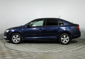 Подержанный автомобиль Skoda Rapid Liftback 2015 года (8 фото)