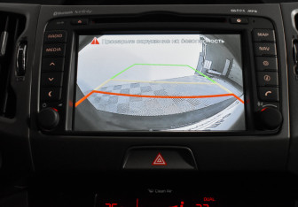 Подержанный автомобиль Kia Sportage 2014 года (17 фото)