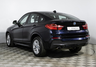 Подержанный автомобиль BMW X4 2015 года (7 фото)