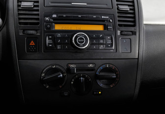 Подержанный автомобиль Nissan Tiida Sedan 2008 года (11 фото)